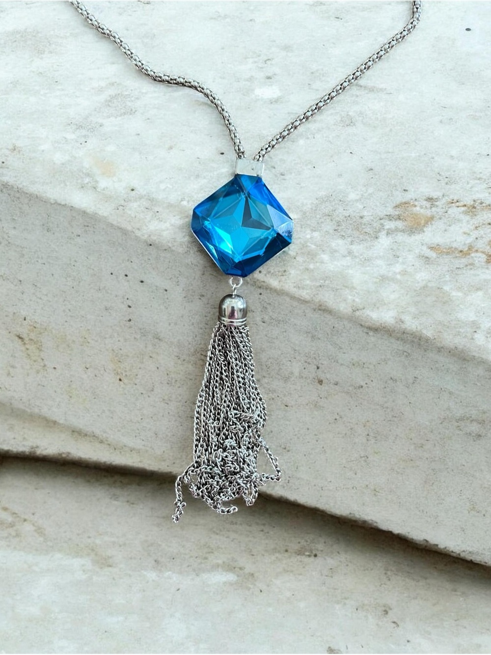 Silver-Tone Necklace with Blue Faceted Crystal and Tassel